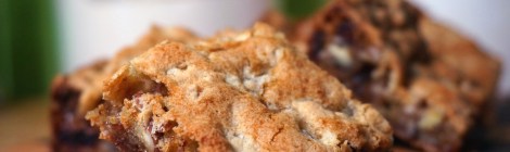 One pristine Abject apology bar is propped up in the foreground, with others, unfocused behind, and canisters of sugar and flour still further behind.